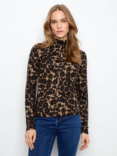 Leopard print top with a chic mock neckline, perfect for adding a touch of wild elegance to any outfit. By Charlie B.