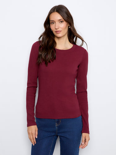 This top features a crew neckline and long sleeves, crafted for style and comfort. Perfect for any casual outing by Charlie B.
