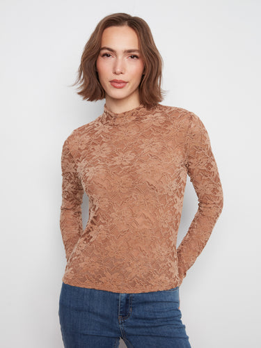 Chic top with a mock neck design, featuring intricate flocked lace detailing for an elegant touch. By Charlie B.