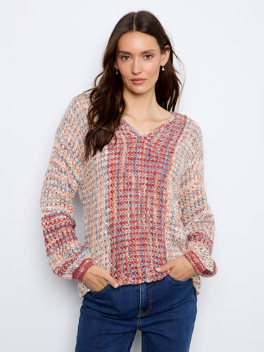 Sweater featuring a V-neckline with colorful novelty yarn, offering a unique texture and style. By Charlie B.