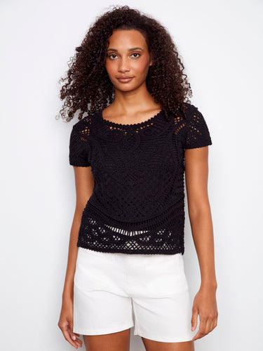 Black crochet top featuring a scoop neckline and crafted from 100% cotton, offering breathable comfort by Charlie B.
