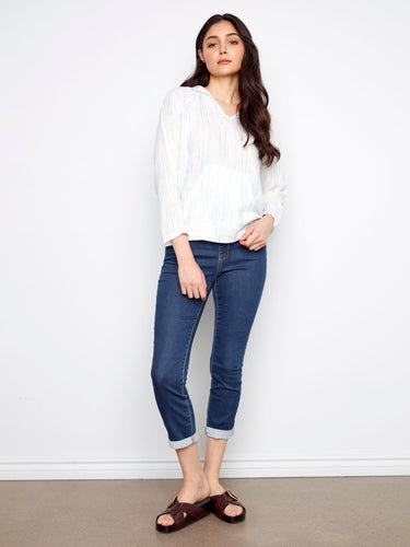 Stylish white top featuring a practical kangaroo pocket, ideal for keeping essentials close. Crafted from breathable cotton by Charlie B.