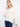 Soft white hoodie with a cozy kangaroo pocket, perfect for casual outings. Made from 100% cotton for ultimate comfort by Charlie B.