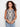 Linen blend blouse with abstract print in Tahiti hues, highlighted by a scoop neckline and sleeveless design by Charlie B.