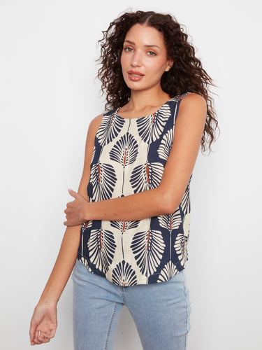 Serene blue floral print blouse with a stylish scoop neckline and rounded hem by Charlie B.