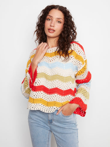 Colorful crochet top featuring drop shoulders and a scalloped hem, crafted from a cotton blend by Charlie B.