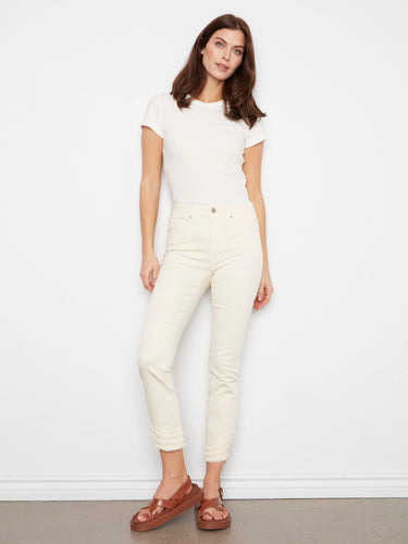 These skinny fit pants feature a stylish frayed hem detail, perfect for a chic casual look by Charlie B.