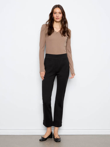 Black straight-leg ponte pants featuring ankle length and rolled cuffs by Charlie B.