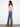 Stylish long-length medium blue jeans with intricate side floral embroidery, perfect for any occasion by Charlie B.