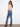 Embrace the five-pocket design of these medium blue bootcut jeans, enhanced with beautiful side floral details by Charlie B.