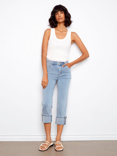 Experience the comfort of stretch denim with these jeans, featuring a stylish snap button detail on the cuff by Charlie B.