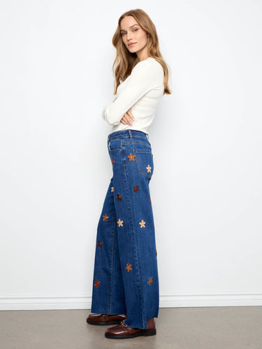Crafted from stretch denim, these jeans provide both flexibility and style. The regular rise adds to their classic appeal by Charlie B.