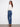 Stylish stretch denim jeans with button details on side pockets for a chic look, created by Charlie B.