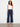 Navy pants with a belted waist, showcasing the cropped length and wide leg design for a chic look by Charlie B.