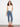 Blue cropped jeans with a slim fit and flared leg, highlighting the floral hem trim for a trendy look by Charlie B.