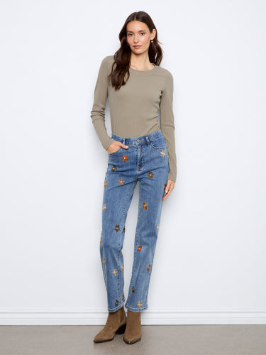 Denim jeans featuring straight leg design with exquisite floral embroidery. Perfect for casual outings and comfort. By Charlie B.