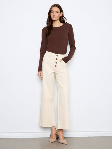 Stylish wide leg pants with a chic button closure, perfect for any occasion. Crafted for comfort and style by Charlie B.