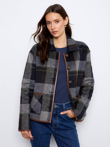 Navy plaid jacket with a versatile reversible design, accented by button-front closure and leather binding by Charlie B.