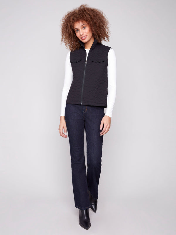 Stylish vest featuring a zip front closure and high collar, adding versatility to any outfit by Charlie B.