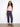 Denim pants with a slim fit and braided belt, showcasing adjustable cuffed hems for versatile styling by Charlie B.