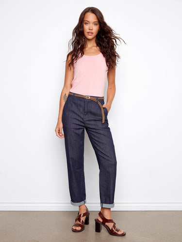 Denim pants with a slim fit and braided belt, showcasing adjustable cuffed hems for versatile styling by Charlie B.