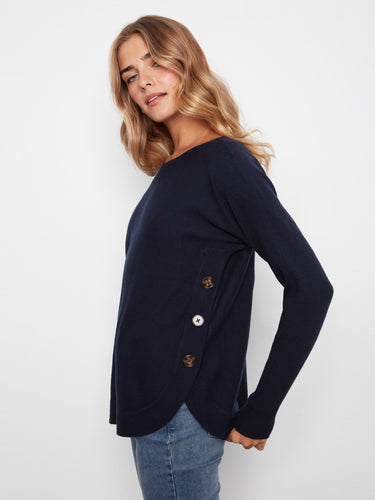 Navy knit sweater with a boat neck and ribbed sleeves, featuring stylish side button details for a chic look by Charlie B.
