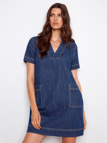This dress showcases patch pockets and a stylish V-neck collar, offering a blend of functionality and fashion by Charlie B.