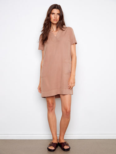 This dress features a stylish collared V-neck design, adding a touch of elegance to your look. Perfect for any occasion. By Charlie B.