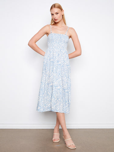 Light blue floral pattern dress with midi length, perfect for versatile styling. Features a unique removable strap by Charlie B.