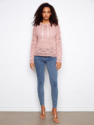 Elegant pink crochet sweater with adjustable drawstrings, offering both style and comfort in 100% cotton by Charlie B.