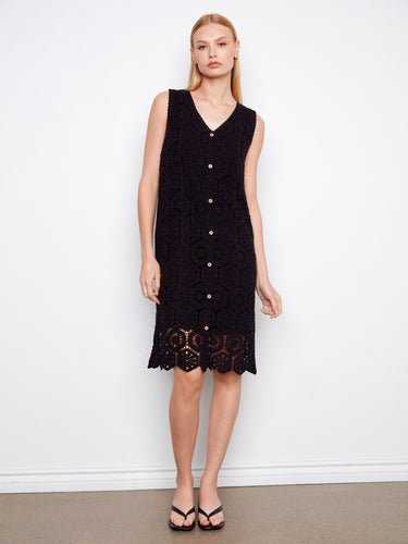 Elegant black dress featuring a V-neckline and sleeveless design, perfect for warm weather occasions. By Charlie B.