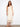 This dress features a V-neckline and showcases a classic, elegant style perfect for any occasion. By Charlie B.