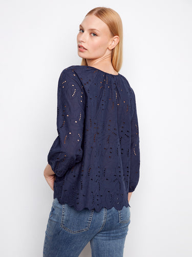 Chic navy top showcasing scalloped hem and elastic cuffs for a comfortable yet fashionable style by Charlie B.
