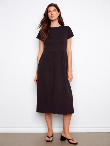 Black cotton midi dress featuring a comfortable crew neckline, perfect for casual outings by Charlie B.