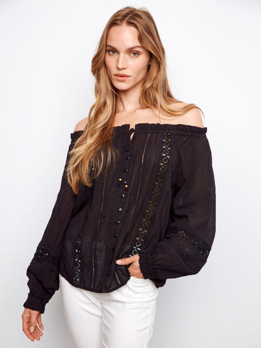 Black blouse with semi-sheer cotton fabric and lace-up front, featuring elastic cuffs by Charlie B.