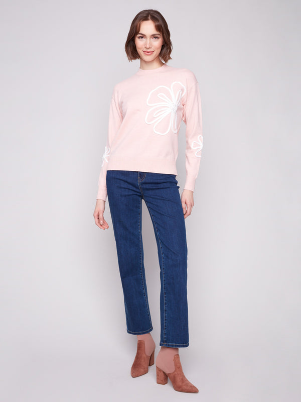 Elegant long-sleeve sweater showcasing a crew neck design and floral soutache embellishments by Charlie B.