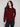 Stylish cabernet crew neck sweater highlighted by its comfortable knit cuffs and sleek design by Charlie B.