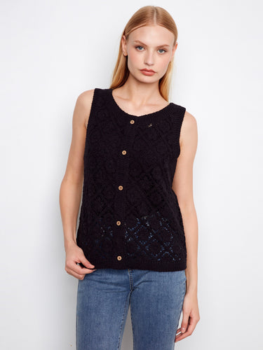 This sleeveless top features a classic crew neckline, perfect for layering or wearing alone. Designed by Charlie B.