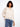 A stylish cotton blend top featuring a crew neck and intricate knit design, perfect for a relaxed fit. By Charlie B.