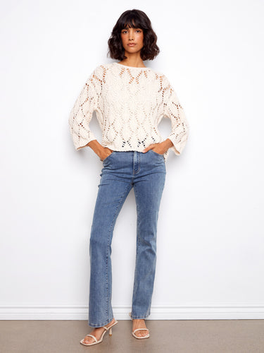 This elegant top offers 3/4 sleeves and a comfortable cotton blend, ideal for everyday wear. By Charlie B.