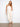 Natural-colored cropped jeans with a comfortable barrel leg and stretch twill fabric, offering style and ease by Charlie B.