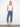 Denim jeans featuring a stylish flare fit and intricate lace hem detail, perfect for adding flair to any outfit. By Charlie B.