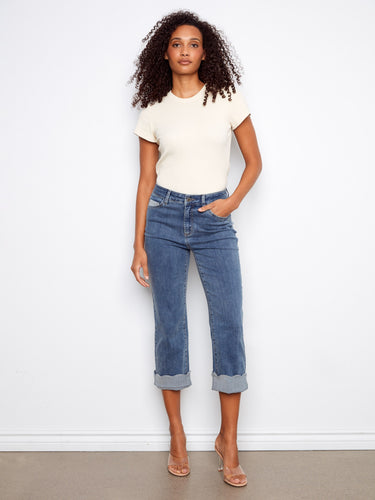 Blue cropped jeans with a straight fit and regular rise, enhanced by a scallop cuff for added style by Charlie B.