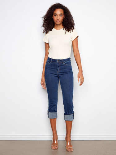 Stylish cropped denim pants in a slim fit, designed with versatility in mind, perfect for any wardrobe. By Charlie B.