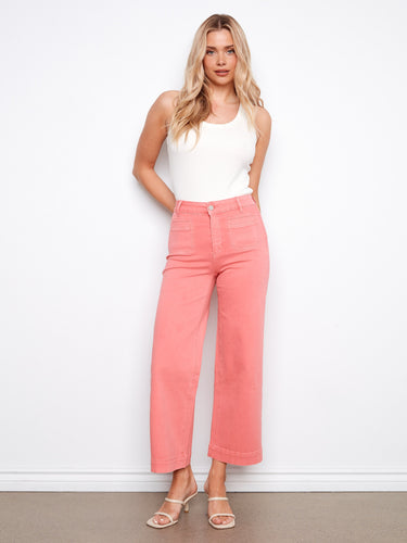 These pants feature a stylish flare fit, adding a touch of elegance to any outfit. By Charlie B.