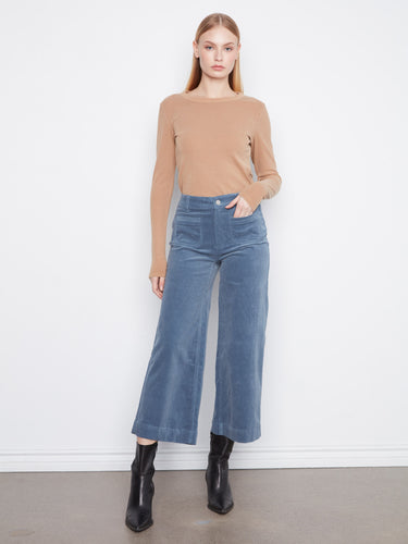 These pants feature a wide leg design, offering a stylish silhouette perfect for any occasion. By Charlie B.