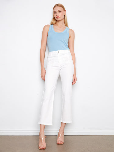 White cropped jeans with eyelet patch pockets and a straight fit, offering a chic look by Charlie B.
