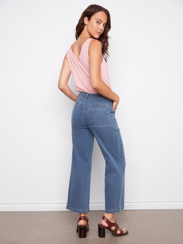 Regular rise denim pants designed to flatter, complete with utility pockets for added functionality by Charlie B.