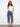 Denim pants featuring a wide fit and cropped length, highlighted by intricate flower embroidery at the hem. By Charlie B.