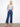 Indigo jeans featuring wide-leg design and stretch denim for comfort, complete with button closure by Charlie B.